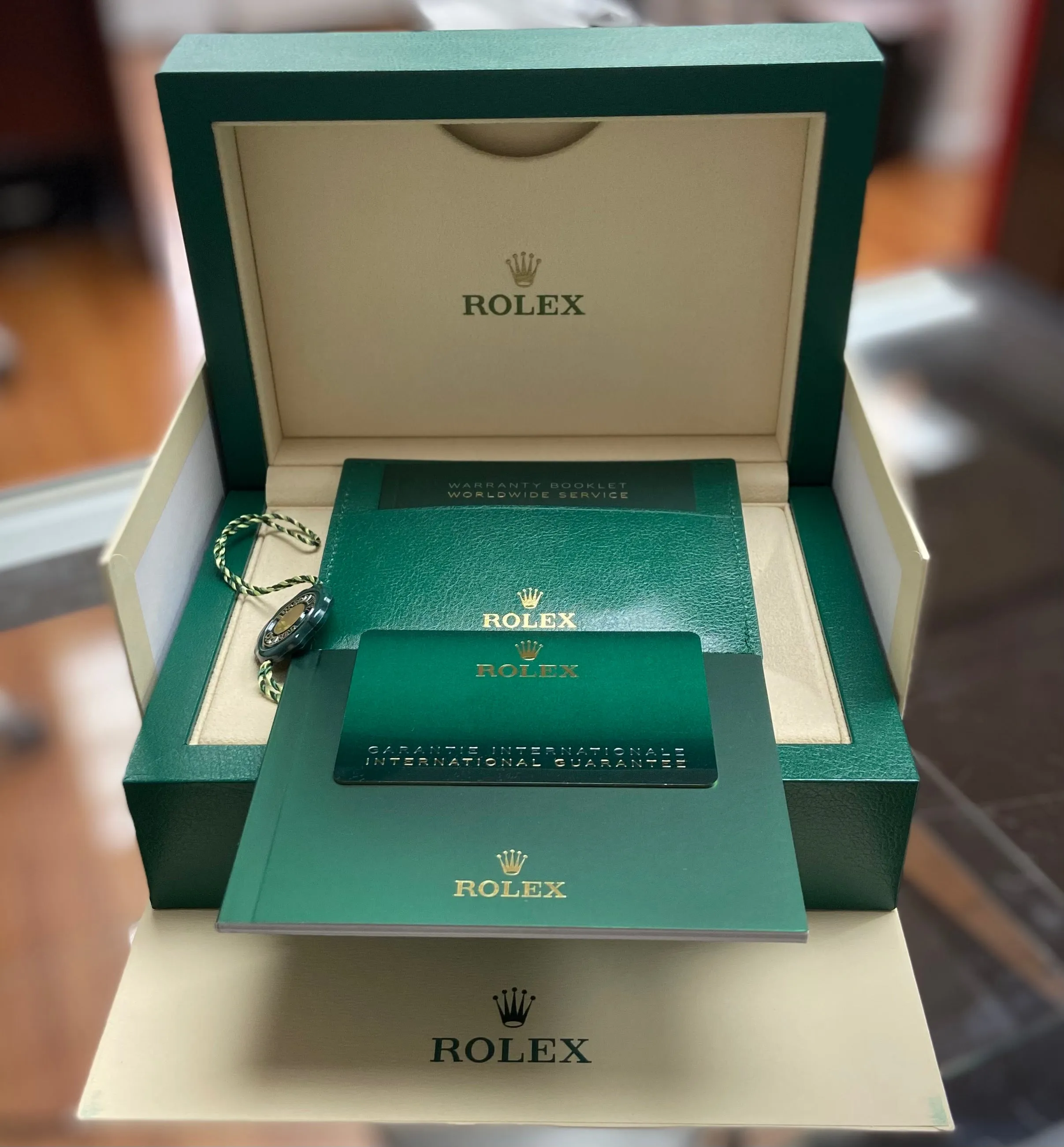 Rolex Day-Date 40mm Chocolate Baguette Dial Rose Gold 228235